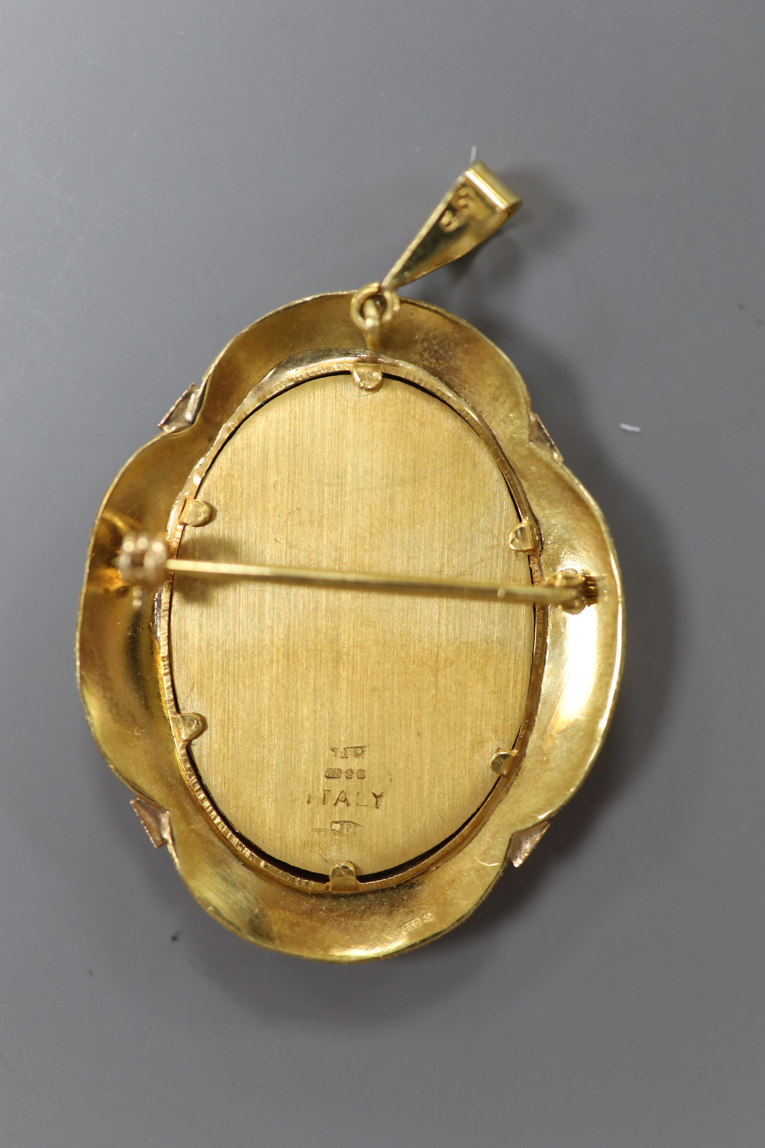 A modern Italian 18ct gold mounted miniature oval gem set portrait of a lady pendant brooch, 41mm, gross 10.8 grams.